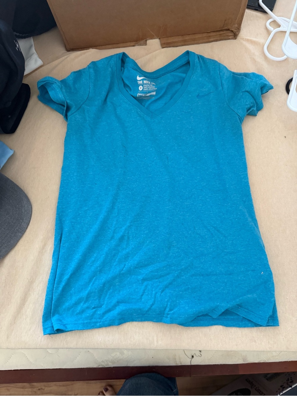 Nike Women’s V-Neck Tee in Teal Blue